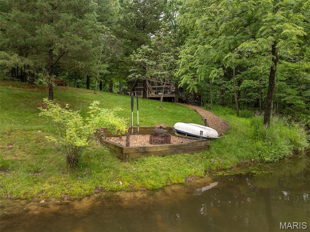 483 Hummingbird View Dr, Innsbrook, MO 63390 - view of grassy yard with a view of trees