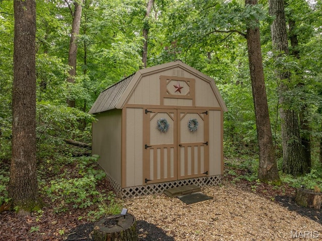 483 Hummingbird View Dr, Innsbrook, MO 63390 - view of shed featuring a wooded view