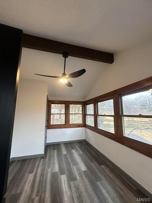 63 Spanish Wells Ct, Osage Beach, MO 65065 - spare room with dark wood-type flooring, a ceiling fan, and healthy amount of natural light