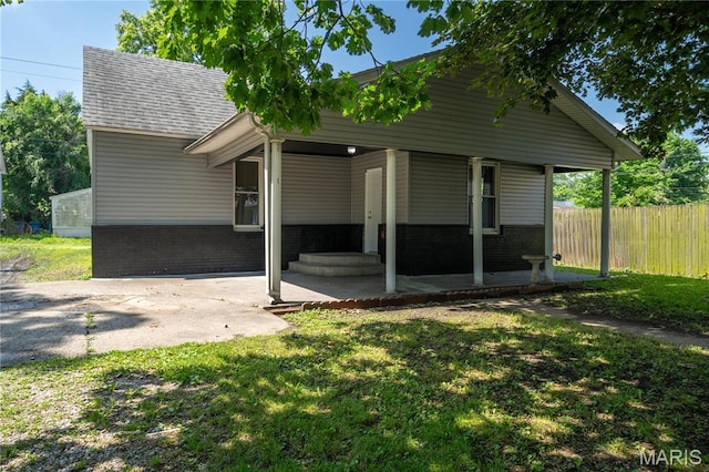 2428 E 25th St, Granite City, IL 62040 - view of front of home with brick siding and a porch