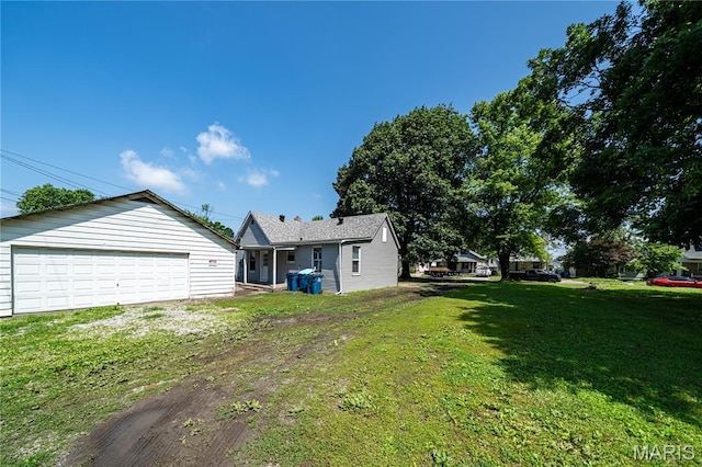 2428 E 25th St, Granite City, IL 62040 - view of green lawn featuring a garage
