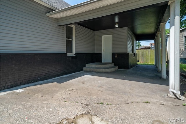 2428 E 25th St, Granite City, IL 62040 - doorway to property featuring brick siding