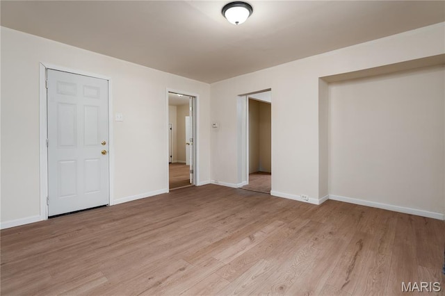 2428 E 25th St, Granite City, IL 62040 - unfurnished room with light wood-type flooring and baseboards