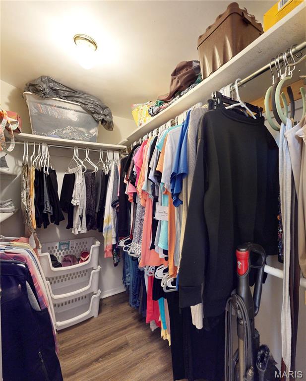 408 Kipling Way Unit A, Weldon Spring, MO 63304 - walk in closet with wood finished floors