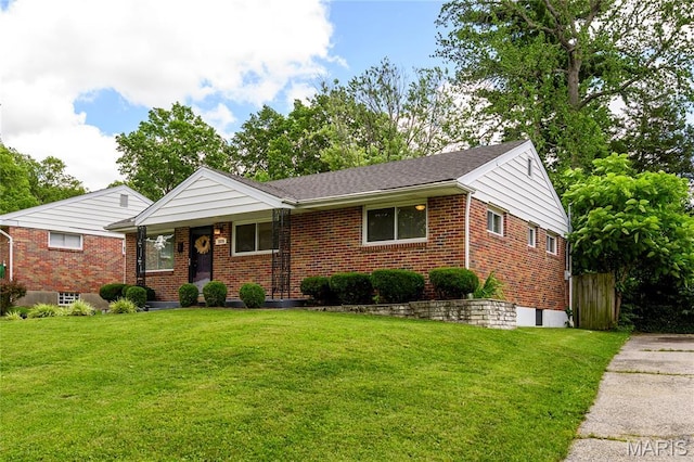7870 Trenton Ave, University City, MO 63130 - view of front of property featuring brick siding, a front lawn, and a porch