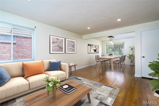 7870 Trenton Ave, University City, MO 63130 - living room with recessed lighting and dark wood-style floors