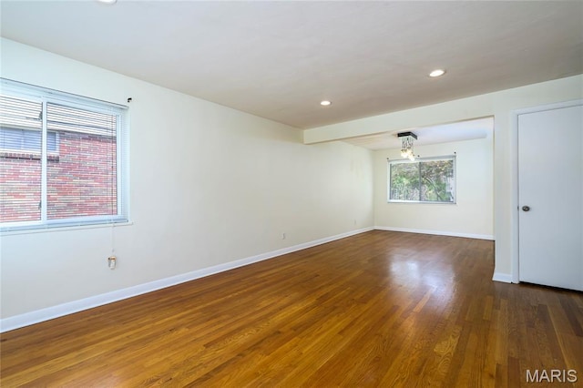 7870 Trenton Ave, University City, MO 63130 - spare room with wood finished floors and recessed lighting