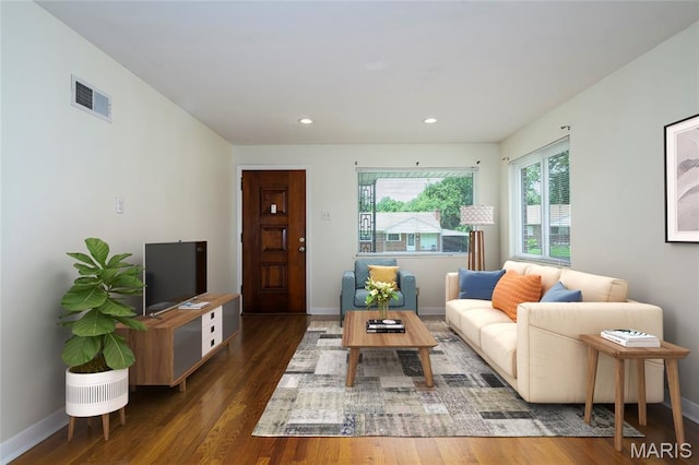 7870 Trenton Ave, University City, MO 63130 - living room with wood finished floors and recessed lighting