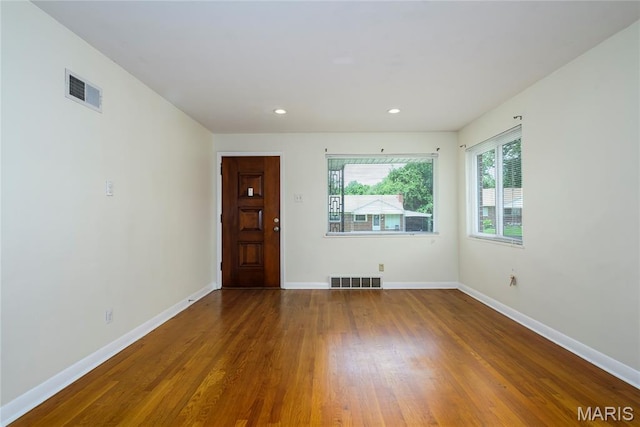 7870 Trenton Ave, University City, MO 63130 - spare room featuring wood finished floors and recessed lighting