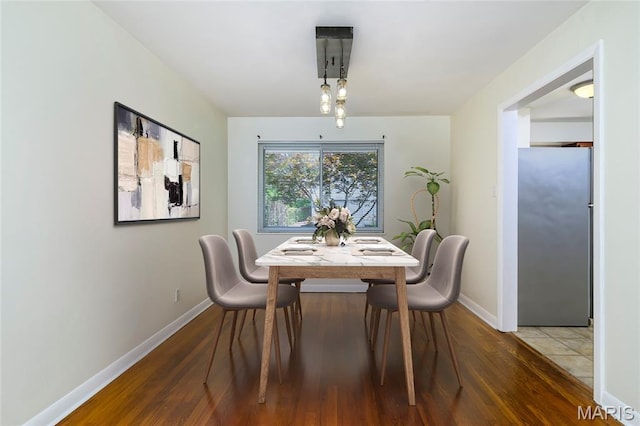 7870 Trenton Ave, University City, MO 63130 - dining space featuring wood finished floors and baseboards