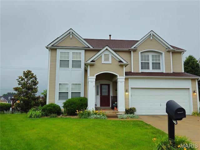 1751 Briarmanor Dr, Lake St Louis, MO 63367 - traditional home with driveway, a garage, and a front lawn