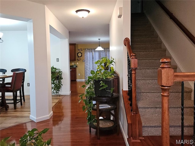 1751 Briarmanor Dr, Lake St Louis, MO 63367 - stairs with wood finished floors and baseboards