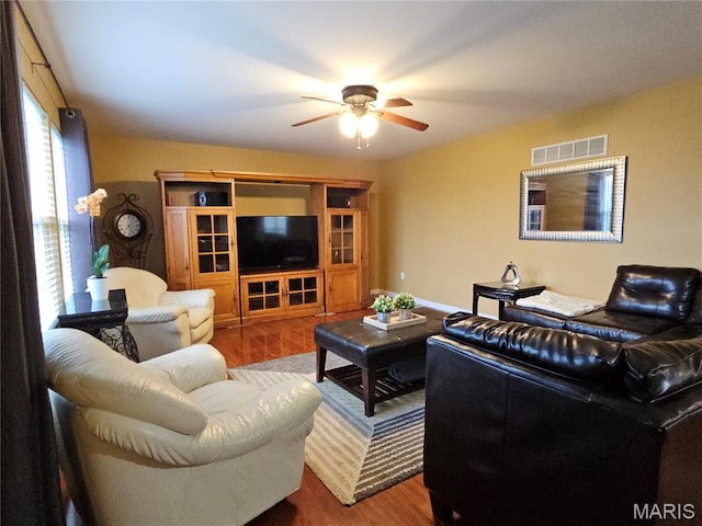 1751 Briarmanor Dr, Lake St Louis, MO 63367 - living area with ceiling fan and wood finished floors