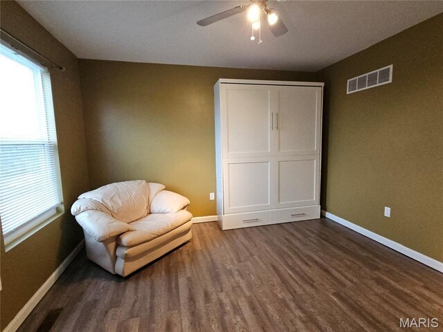 1751 Briarmanor Dr, Lake St Louis, MO 63367 - living area featuring dark wood finished floors and ceiling fan