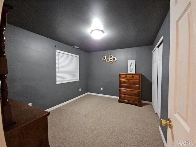 1751 Briarmanor Dr, Lake St Louis, MO 63367 - unfurnished bedroom featuring carpet and a closet