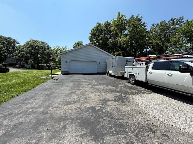 506 W Saint Clair St, Freeburg, IL 62243 - view of home's exterior with a lawn and a garage