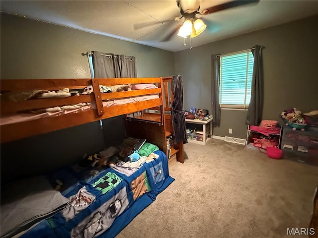 205 S 6th, Shelbina, MO 63468 - carpeted bedroom featuring ceiling fan and baseboards