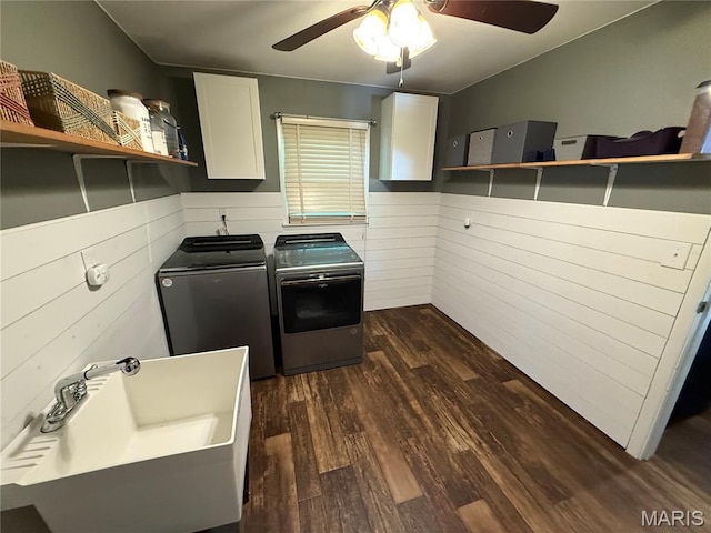 205 S 6th, Shelbina, MO 63468 - laundry room featuring separate washer and dryer, cabinet space, a ceiling fan, dark wood-type flooring, and a wainscoted wall