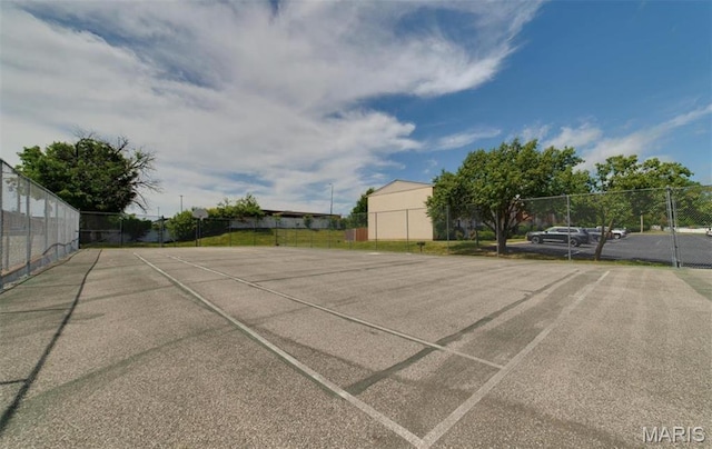 811 Wendevy Ct, Ballwin, MO 63011 - view of vehicle parking with a tennis court