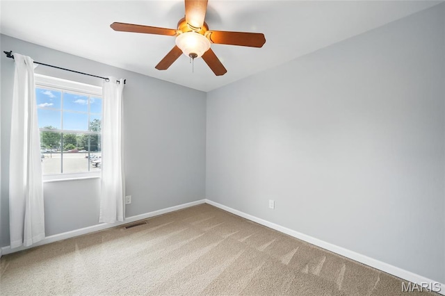 811 Wendevy Ct, Ballwin, MO 63011 - carpeted spare room with baseboards and ceiling fan