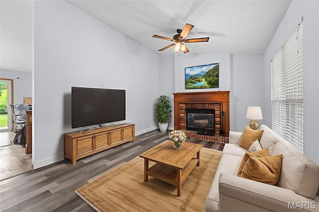 1203 Summerwood Dr, Saint Peters, MO 63376 - living area with lofted ceiling, wood finished floors, a fireplace, and ceiling fan