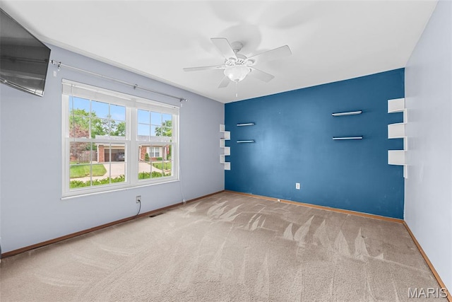 1203 Summerwood Dr, Saint Peters, MO 63376 - spare room featuring carpet floors and a ceiling fan