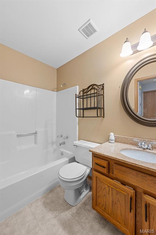 1203 Summerwood Dr, Saint Peters, MO 63376 - full bathroom with vanity and  shower combination
