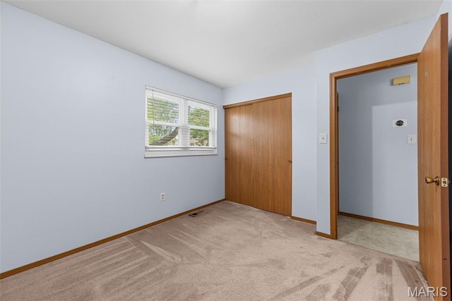 1203 Summerwood Dr, Saint Peters, MO 63376 - unfurnished bedroom featuring a closet and carpet floors