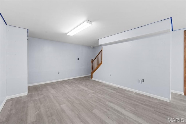 1203 Summerwood Dr, Saint Peters, MO 63376 - finished basement with stairway and wood finished floors
