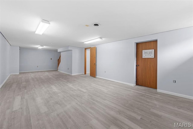 1203 Summerwood Dr, Saint Peters, MO 63376 - finished below grade area featuring baseboards and light wood-type flooring
