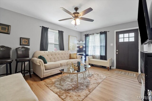 135 Anabel Ave, Saint Louis, MO 63135 - living room featuring light wood-style floors and a ceiling fan