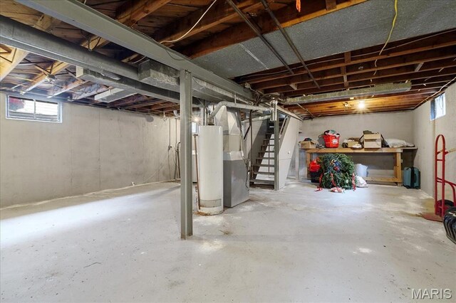 135 Anabel Ave, Saint Louis, MO 63135 - basement featuring stairway and gas water heater