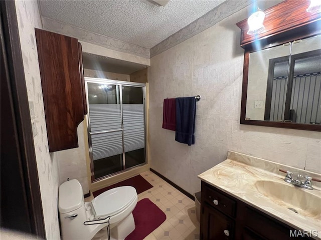 32 Bobwhite Ln, Troy, MO 63379 - full bathroom featuring a textured ceiling, tile patterned floors, vanity, and a stall shower