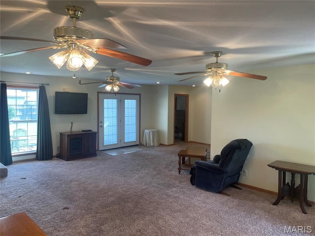 1036 Red Arrow, Sikeston, MO 63801 - living area with carpet, ceiling fan, and plenty of natural light