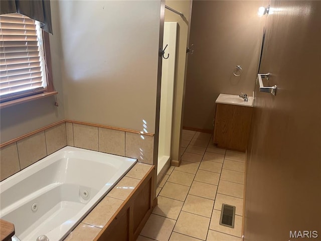 1036 Red Arrow, Sikeston, MO 63801 - bathroom featuring tile patterned floors, a tub with jets, vanity, and a shower