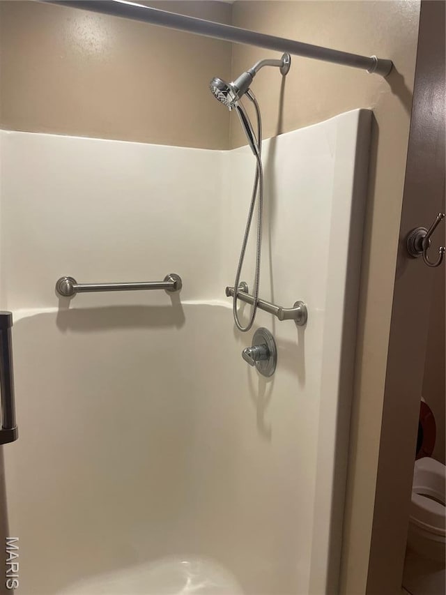 1036 Red Arrow, Sikeston, MO 63801 - bathroom featuring a shower and toilet