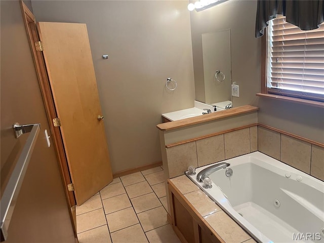 1036 Red Arrow, Sikeston, MO 63801 - full bathroom featuring a tub with jets, tile patterned floors, and vanity