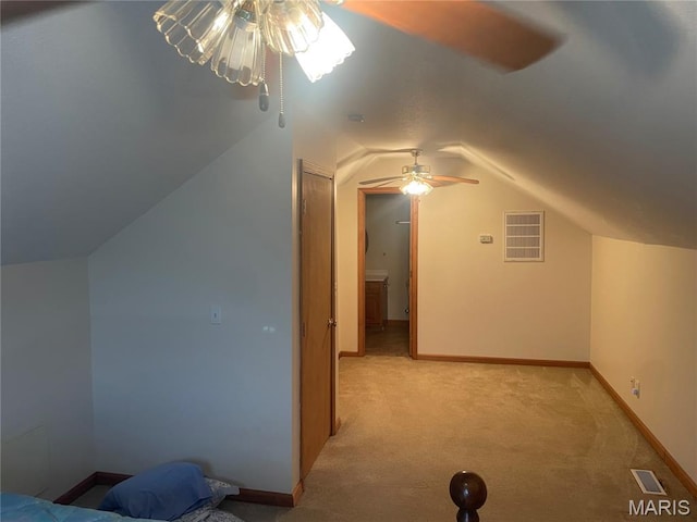 1036 Red Arrow, Sikeston, MO 63801 - additional living space with a ceiling fan, light colored carpet, and vaulted ceiling