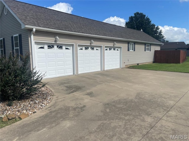 1036 Red Arrow, Sikeston, MO 63801 - view of home's exterior with driveway, a garage, and a shingled roof