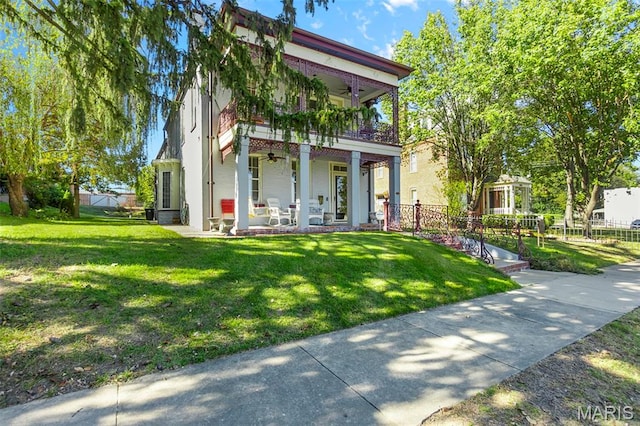 309 S Spanish Cpe, Girardeau, MO 63701 - view of front of home featuring a ceiling fan, covered porch, and a balcony