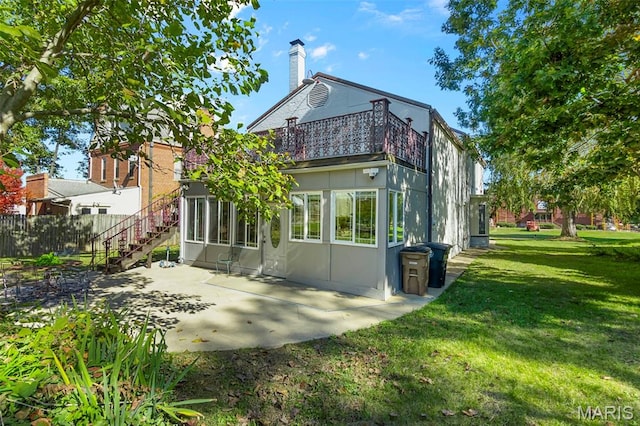 309 S Spanish Cpe, Girardeau, MO 63701 - back of property featuring a balcony, a patio, and stairs