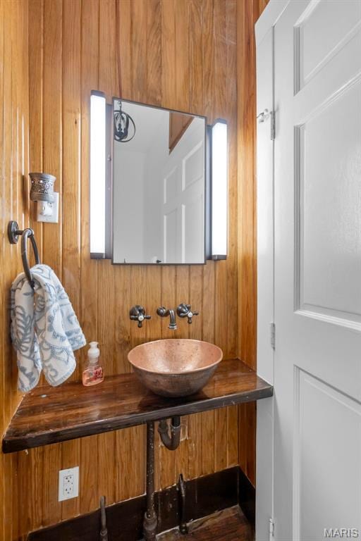 309 S Spanish Cpe, Girardeau, MO 63701 - bathroom with wooden walls and vanity