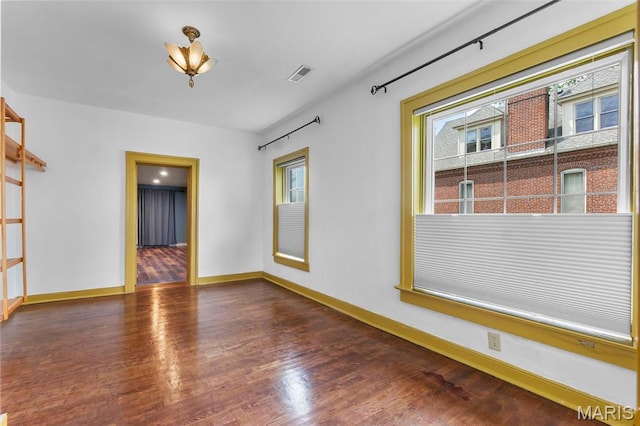 309 S Spanish Cpe, Girardeau, MO 63701 - spare room with wood finished floors and baseboards