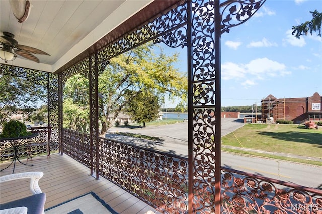 309 S Spanish Cpe, Girardeau, MO 63701 - wooden porch featuring a ceiling fan