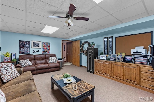 277 Althaea Ln, Jackson, MO 63755 - carpeted living room featuring a drop ceiling and a ceiling fan