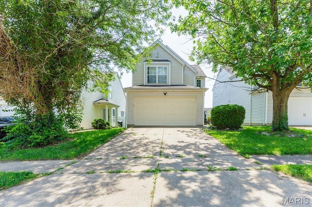 11256 Liberty Landing Dr, Florissant, MO 63033 - traditional-style house featuring a garage and driveway
