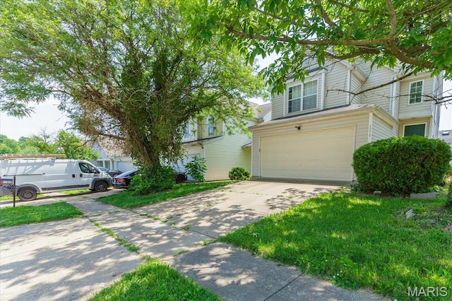 11256 Liberty Landing Dr, Florissant, MO 63033 - view of front of house with an attached garage and driveway