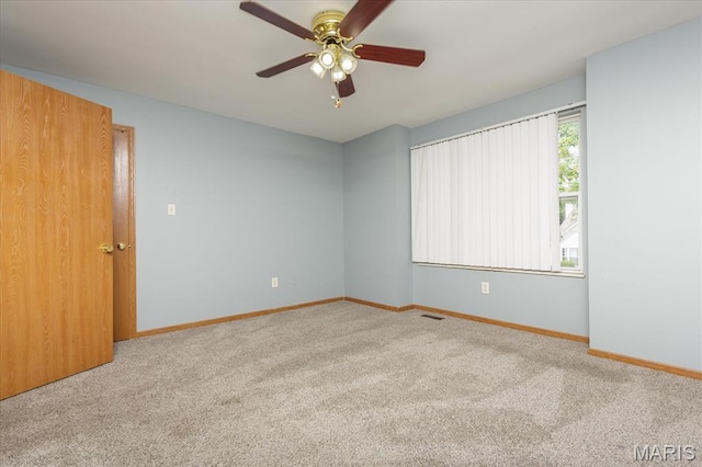 11256 Liberty Landing Dr, Florissant, MO 63033 - unfurnished room featuring carpet flooring, a ceiling fan, and baseboards