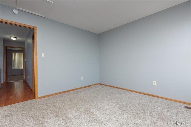 11256 Liberty Landing Dr, Florissant, MO 63033 - empty room with carpet flooring, baseboards, and a smoke detector