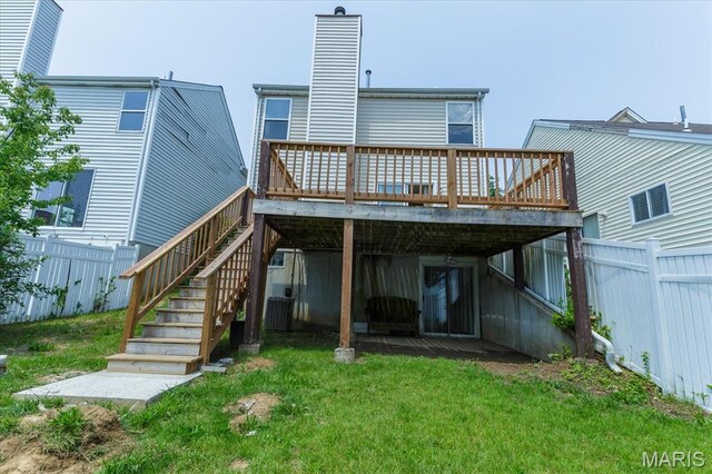 11256 Liberty Landing Dr, Florissant, MO 63033 - back of house with a deck, a chimney, and stairway